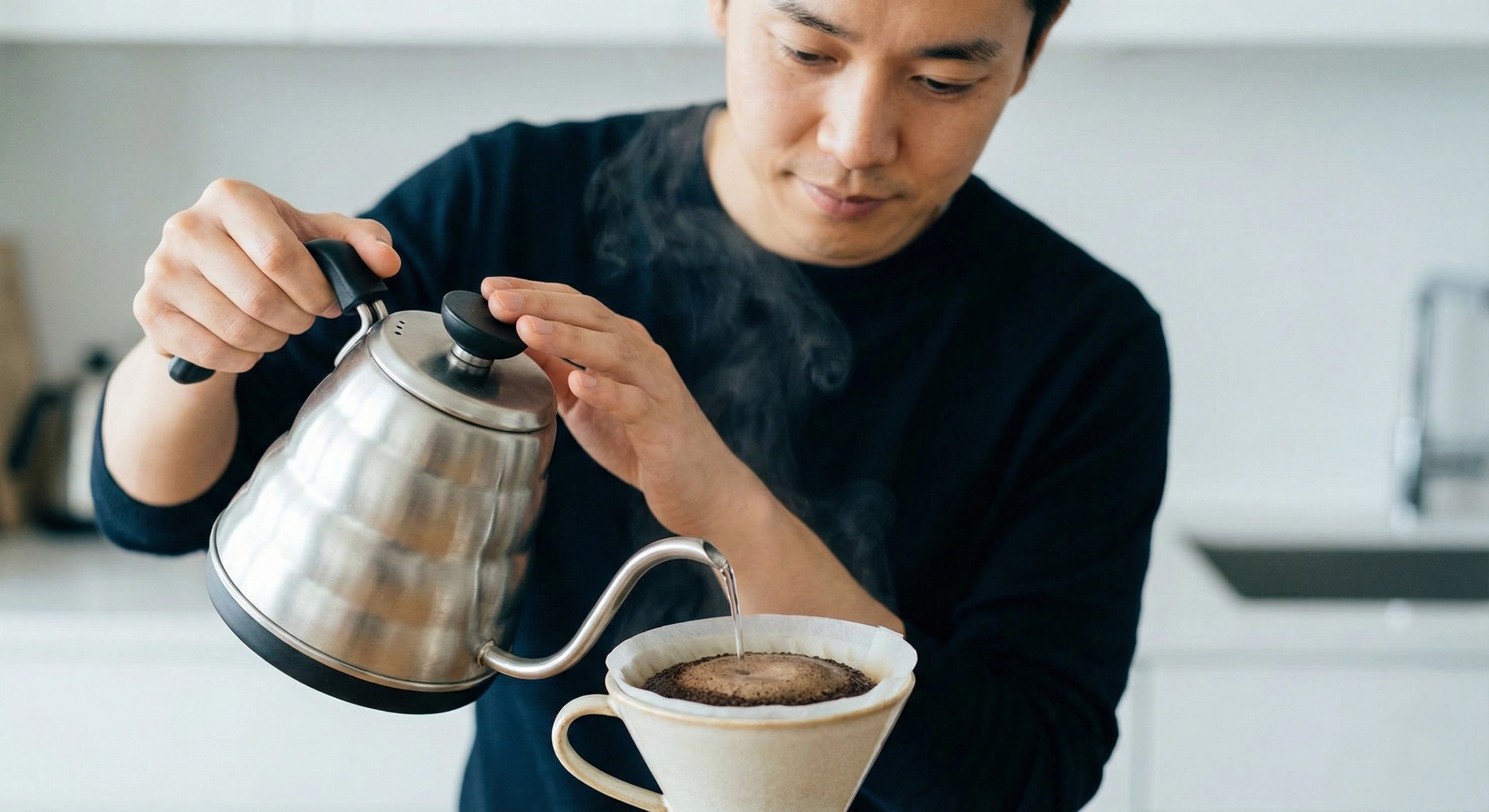 Close-up of a man pouring coffee slowly as a daily micro-mindfulness practice to reduce stress.