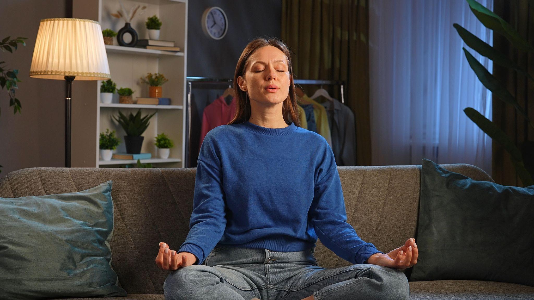 Woman Practicing Meditation in a Calm Home Environment
